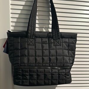 Reebok Ellie Dual Compartment Nylon Tote with Suitcase Loop on the back.